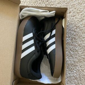 Never worn Adidas Kids Sneakers in Black with White Stripes and Brown Sole